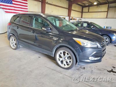 Czwarte zdjęcie samochodu z boku: 2014 FORD ESCAPE TITANIUM VIN:1FMCU9J90EUA75859 - miniatura