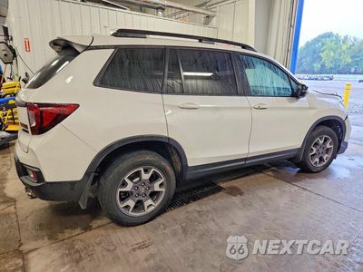 Trzecie zdjęcie samochodu z tyłu: 2023 HONDA PASSPORT TRAIL SPORT VIN:5FNYF8H68PB007864 - miniatura