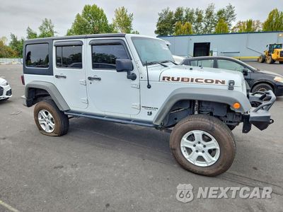 Czwarte zdjęcie samochodu z boku: 2015 JEEP WRANGLER UNLIMITED RUBICON VIN:1C4BJWFG6FL592184 - miniatura