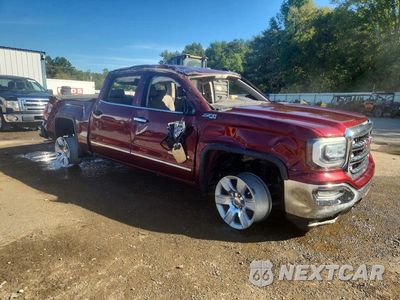 Czwarte zdjęcie samochodu z boku: 2016 GMC SIERRA K1500 SLT VIN:3GTU2NEC9GG259815 - miniatura