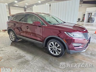 Czwarte zdjęcie samochodu z boku: 2017 LINCOLN MKC SELECT VIN:5LMCJ2D95HUL28607 - miniatura