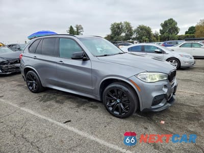 Czwarte zdjęcie samochodu z boku: 2014 BMW X5 XDRIVE35I VIN:5UXKR0C59E0C26469 - miniatura