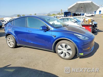 Czwarte zdjęcie samochodu z boku: 2023 TESLA MODEL Y VIN:7SAYGDEE3PA068086 - miniatura
