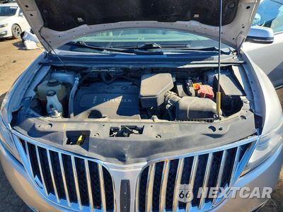 Zdjęcie 12 z 13 samochodu: 2014 LINCOLN MKX VIN:2LMDJ6JK7EBL16728 - miniatura