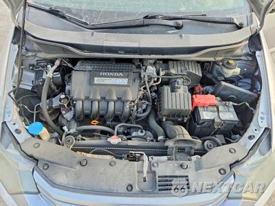 Zdjęcie 12 z 13 samochodu: 2010 HONDA INSIGHT EX VIN:JHMZE2H79AS027675 - miniatura
