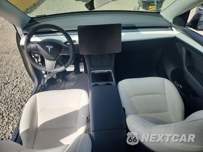 Zdjęcie 8 z 14 samochodu: 2023 TESLA MODEL Y VIN:7SAYGDEF1PF711000 - miniatura