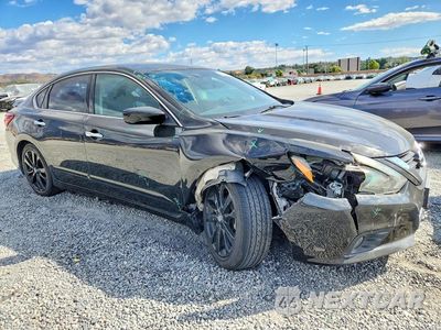 Czwarte zdjęcie samochodu z boku: 2017 NISSAN ALTIMA 2.5 SR VIN:1N4AL3AP1HC238402 - miniatura