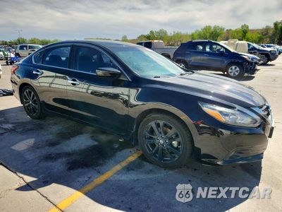Czwarte zdjęcie samochodu z boku: 2017 NISSAN ALTIMA 2.5 SR VIN:1N4AL3APXHC248877 - miniatura