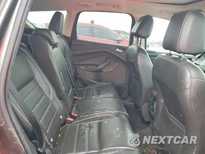 Zdjęcie 11 z 14 samochodu: 2017 FORD ESCAPE TITANIUM VIN:1FMCU9J99HUB66763 - miniatura