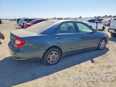 Trzecie zdjęcie samochodu z tyłu: 2002 TOYOTA CAMRY LE V6 VIN:4T1BF30K12U521052 - miniatura