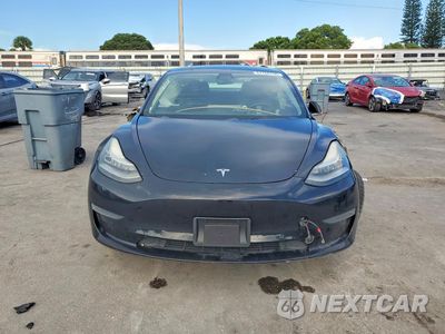 Piąte zdjęcie samochodu w środku: 2019 TESLA MODEL 3 VIN:5YJ3E1EBXKF441847 - miniatura