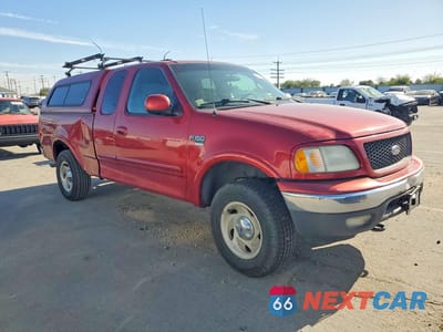 Czwarte zdjęcie samochodu z boku: 2001 FORD F150 VIN:1FTRX18W31NA88984 - miniatura