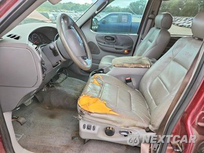 Zdjęcie 7 z 12 samochodu: 2003 FORD F150 SUPERCREW VIN:1FTRW08L13KA63783 - miniatura