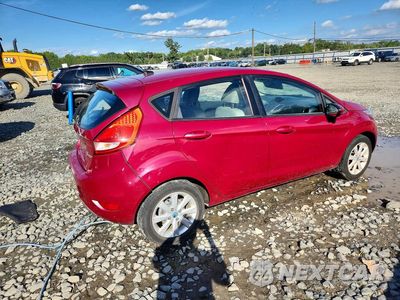Trzecie zdjęcie samochodu z tyłu: 2011 FORD FIESTA SE VIN:3FADP4EJ5BM144199 - miniatura