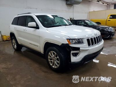 Czwarte zdjęcie samochodu z boku: 2015 JEEP GRAND CHEROKEE LAREDO VIN:1C4RJFAG2FC914213 - miniatura