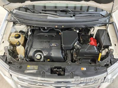 Zdjęcie 12 z 13 samochodu: 2012 FORD EDGE SEL VIN:2FMDK4JC3CBA35738 - miniatura