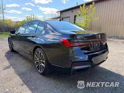 Trzecie zdjęcie samochodu z tyłu: 2022 BMW 7ER XI VIN:WBA7T4C03NCK23662 - miniatura