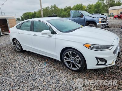Czwarte zdjęcie samochodu z boku: 2020 FORD FUSION TITANIUM VIN:3FA6P0D90LR151977 - miniatura