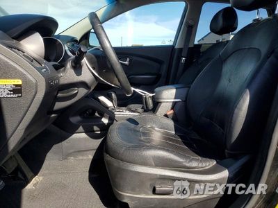 Zdjęcie 7 z 13 samochodu: 2013 HYUNDAI TUCSON LIMITED VIN:KM8JUCAC7DU721090 - miniatura