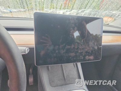 Zdjęcie 9 z 12 samochodu: 2023 TESLA MODEL Y VIN:7SAYGDEE0PA114571 - miniatura