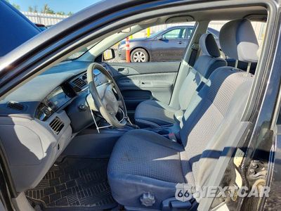 Zdjęcie 7 z 12 samochodu: 2003 MITSUBISHI LANCER ES VIN:JA3AJ26E13U088424 - miniatura