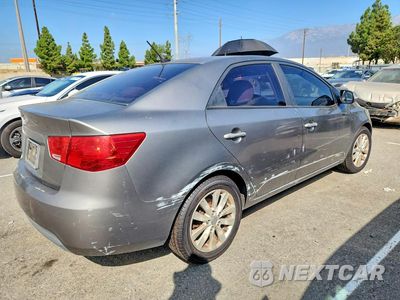 Trzecie zdjęcie samochodu z tyłu: 2010 KIA FORTE EX VIN:KNAFU4A29A5054758 - miniatura