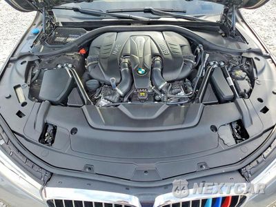 Zdjęcie 11 z 13 samochodu: 2018 BMW 750 I VIN:WBA7F0C50JGM22585 - miniatura