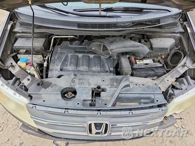 Zdjęcie 12 z 14 samochodu: 2012 HONDA ODYSSEY TOURING VIN:5FNRL5H99CB137877 - miniatura