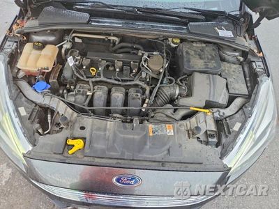 Zdjęcie 11 z 12 samochodu: 2016 FORD FOCUS TITANIUM VIN:1FADP3J25GL249567 - miniatura