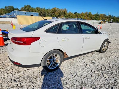 Trzecie zdjęcie samochodu z tyłu: 2016 FORD FOCUS SE VIN:1FADP3F29GL267031 - miniatura