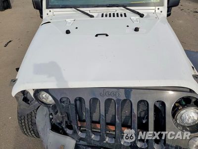 Zdjęcie 11 z 12 samochodu: 2017 JEEP WRANGLER UNLIMITED SPORT VIN:1C4HJWDG7HL542104 - miniatura
