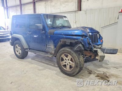 Czwarte zdjęcie samochodu z boku: 2010 JEEP WRANGLER SPORT VIN:1J4AA2D10AL228056 - miniatura