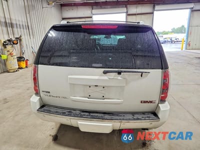 Zdjęcie 6 z 12 samochodu: 2009 GMC YUKON XL DENALI VIN:1GKFK06249J119940 - miniatura