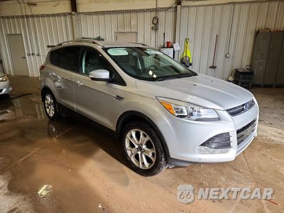 Czwarte zdjęcie samochodu z boku: 2016 FORD ESCAPE TITANIUM VIN:1FMCU0JX0GUA83148 - miniatura