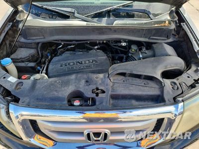 Zdjęcie 12 z 13 samochodu: 2011 HONDA PILOT EXL VIN:5FNYF4H5XBB035304 - miniatura