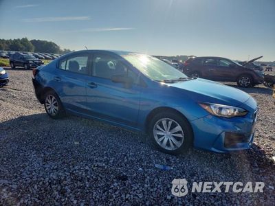 Czwarte zdjęcie samochodu z boku: 2018 SUBARU IMPREZA VIN:4S3GKAA61J3620390 - miniatura