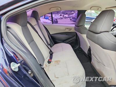Zdjęcie 10 z 12 samochodu: 2021 TOYOTA COROLLA LE VIN:JTDEPMAE3MJ148100 - miniatura