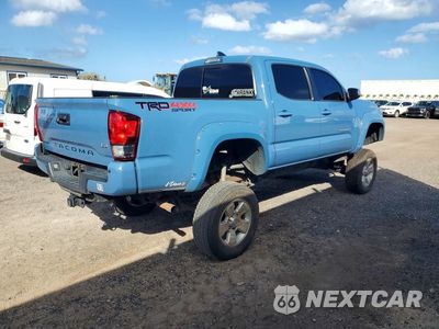Trzecie zdjęcie samochodu z tyłu: 2019 TOYOTA TACOMA SR V6 VIN:3TMCZ5AN7KM202313 - miniatura