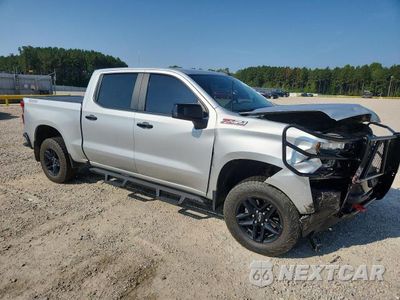 Czwarte zdjęcie samochodu z boku: 2022 CHEVROLET SILVERADO LTD K1500 LT TRAIL BOSS VIN:3GCPYFEL4NG143257 - miniatura