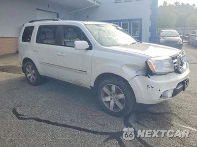 Czwarte zdjęcie samochodu z boku: 2014 HONDA PILOT TOURING VIN:5FNYF4H93EB051027 - miniatura