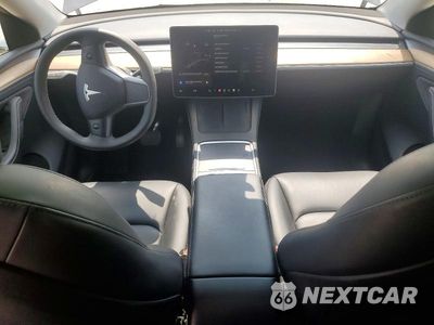 Zdjęcie 8 z 13 samochodu: 2023 TESLA MODEL Y VIN:7SAYGDEE5PA194790 - miniatura