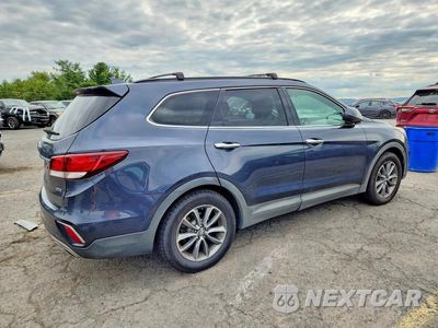 Trzecie zdjęcie samochodu z tyłu: 2017 HYUNDAI SANTA FE SE VIN:KM8SMDHF1HU165746 - miniatura