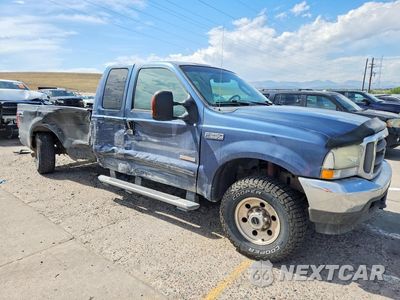 Czwarte zdjęcie samochodu z boku: 2004 FORD F250 SUPER DUTY VIN:1FTNX21P34EC33310 - miniatura
