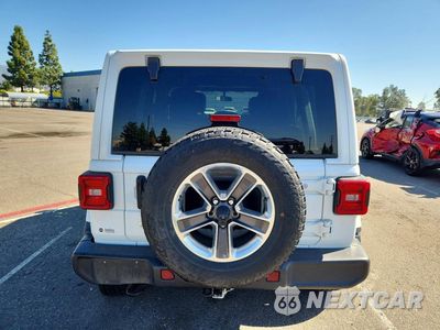 Zdjęcie 6 z 12 samochodu: 2018 JEEP WRANGLER UNLIMITED SAHARA VIN:1C4HJXEG4JW138640 - miniatura
