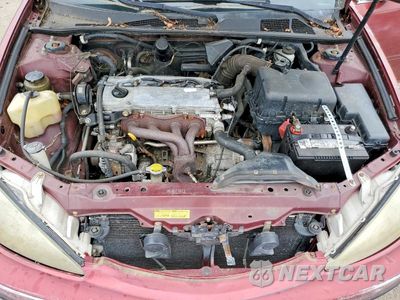 Zdjęcie 11 z 12 samochodu: 2002 TOYOTA CAMRY LE VIN:JTDBE32K620079588 - miniatura