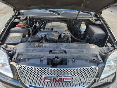 Zdjęcie 12 z 14 samochodu: 2011 GMC YUKON XL DENALI VIN:1GKS2MEF4BR372936 - miniatura