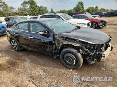 Czwarte zdjęcie samochodu z boku: 2017 NISSAN MAXIMA 3.5 SV VIN:1N4AA6AP9HC362859 - miniatura