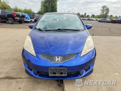 Piąte zdjęcie samochodu w środku: 2009 HONDA FIT SPORT VIN:JHMGE88419S058673 - miniatura