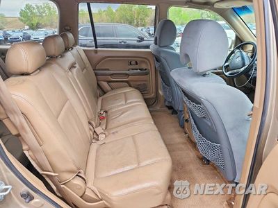 Zdjęcie 11 z 13 samochodu: 2005 HONDA PILOT EXL VIN:2HKYF18565H538252 - miniatura