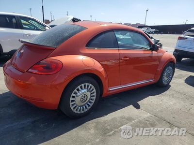 Trzecie zdjęcie samochodu z tyłu: 2016 VOLKSWAGEN BEETLE SE VIN:3VWJ17AT3GM634538 - miniatura